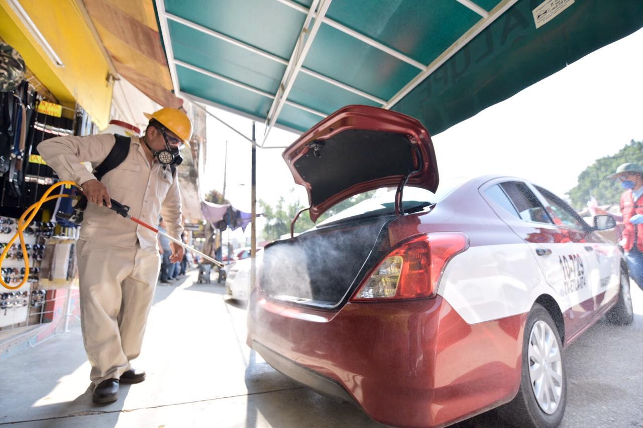 Sanitización de Taxis Colectivos